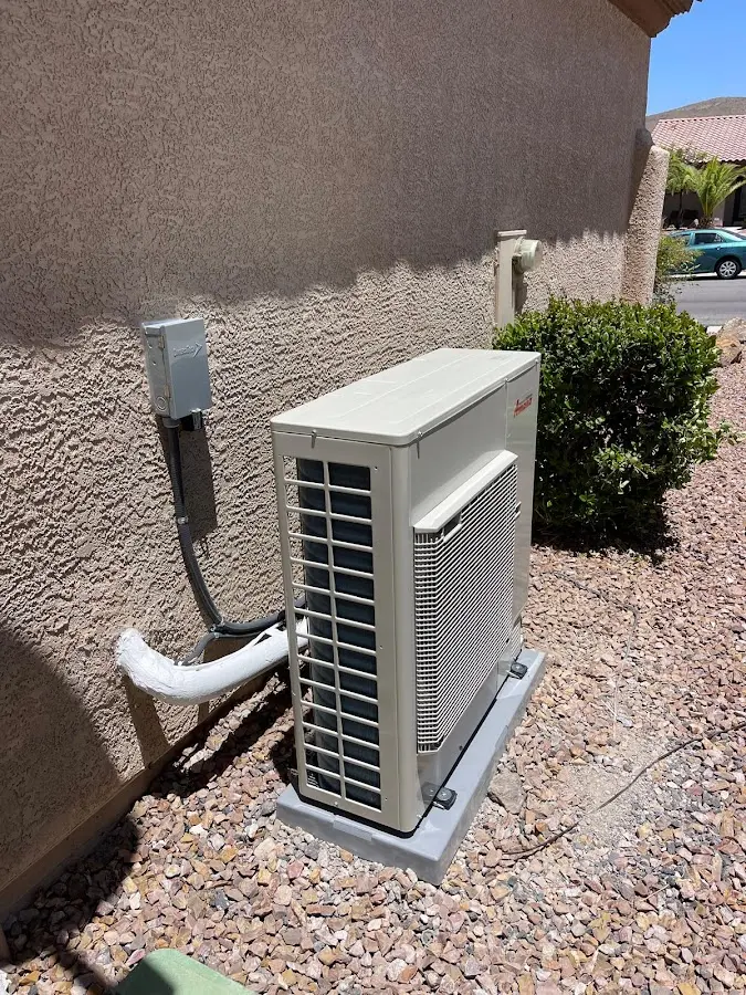 Residential air conditioning condenser unit in De Queen